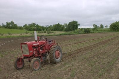 Tractor in Field Planning for spring on the farm