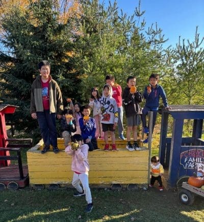 Pumpkin picking at Forsythe Family Farms kids on train - pumpkin time